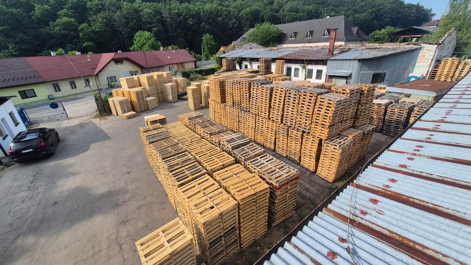 MMLES yard in Krásna Ves with stacks of pallets