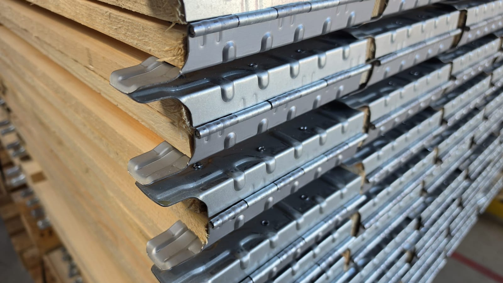 Close-up of the galvanised hinges on pallet collars