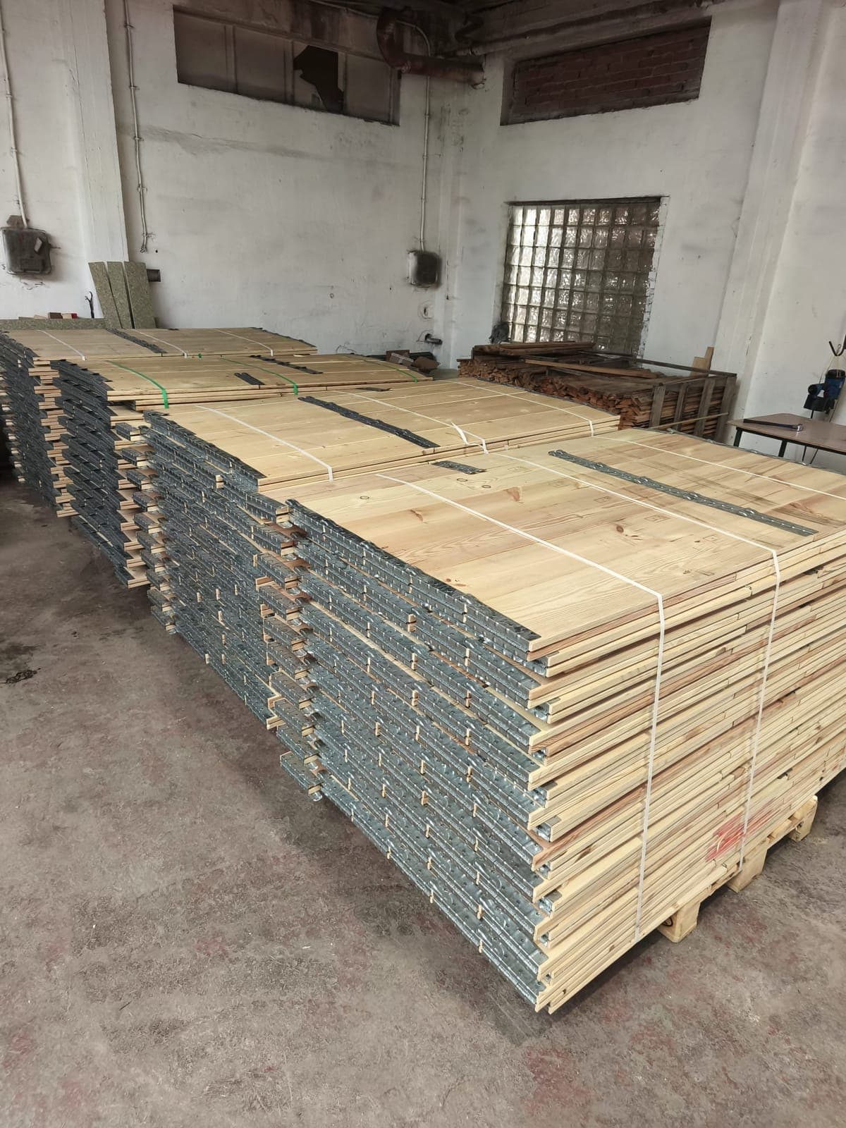 New pallet collars folded on pallets