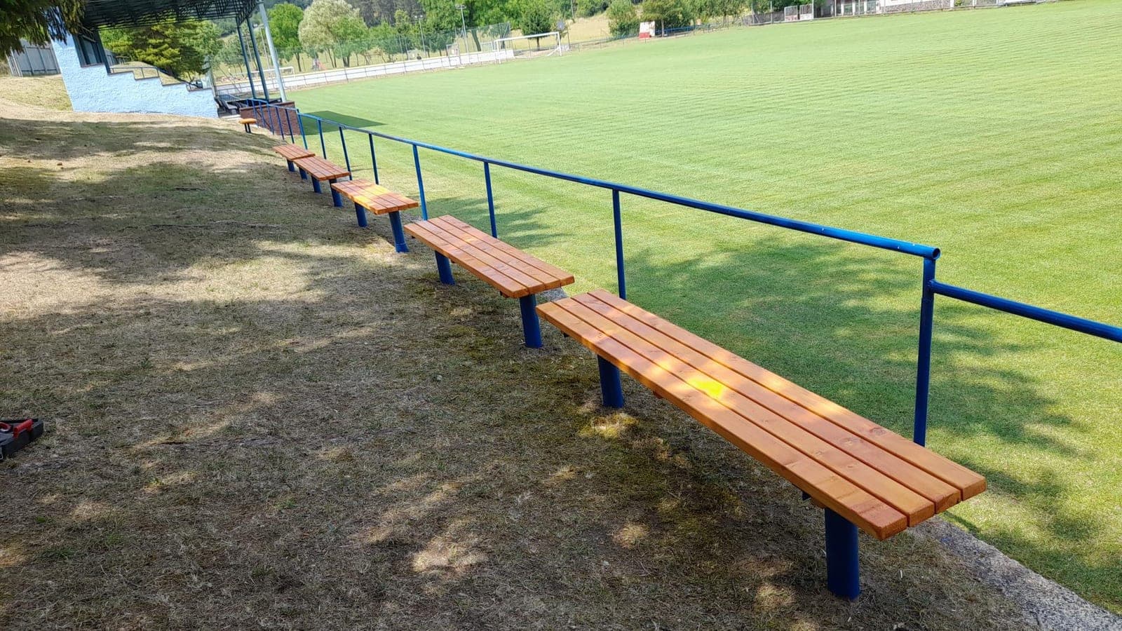 Benches beside the football pitch in Krásna Ves